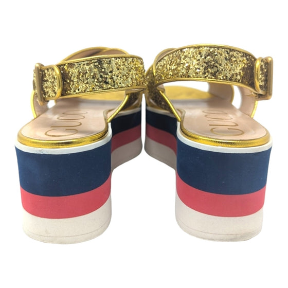 Gucci Peggy platform sandals in gold, size 38.5