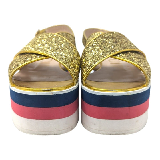 Gucci Peggy platform sandals in gold, size 38.5